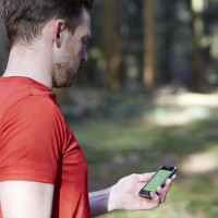Man checking map on cell 